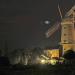 Green UFO spotted over windmill