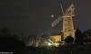 Green UFO spotted over windmill